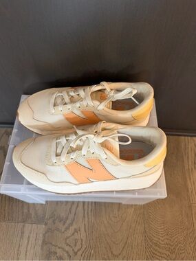 New Balance Women's Cream Sneakers with Peach and Yellow Accents